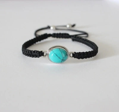 Oval Turquoise stone adjustable hand braided bracelet made in pure silver