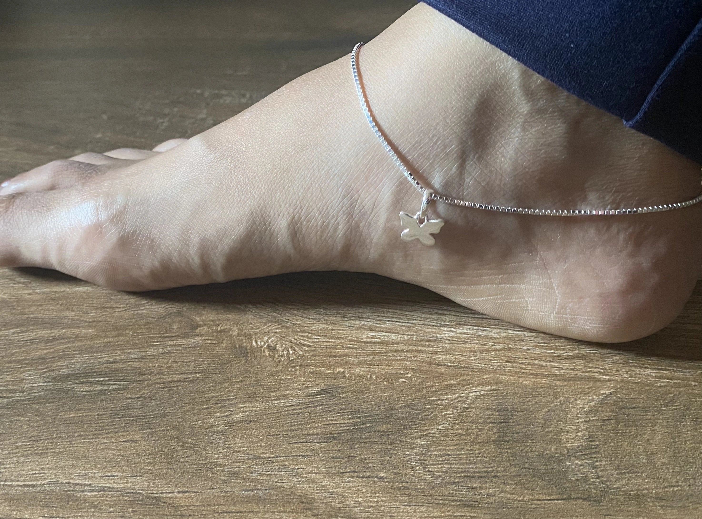 Simple , shiny, box pattern plain 10 inch long anklet with a butterfly charm in Pure Silver